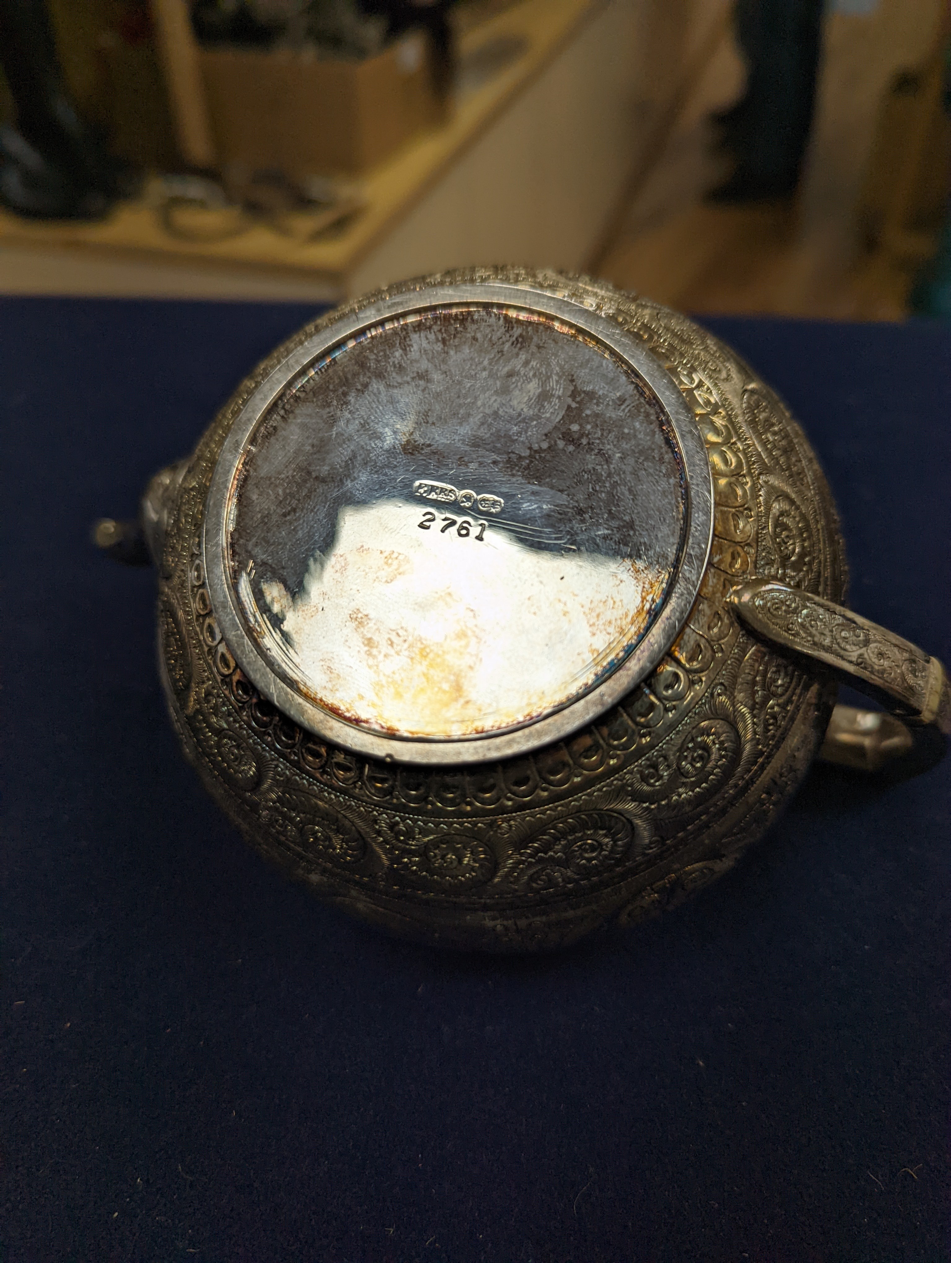 A WMF dish, Islamic white metal mounted photo album and a plated teapot and jug